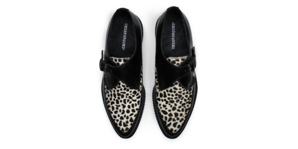 underground shoes apollo buckle creeper in black leather with a black and white leopard print front apron